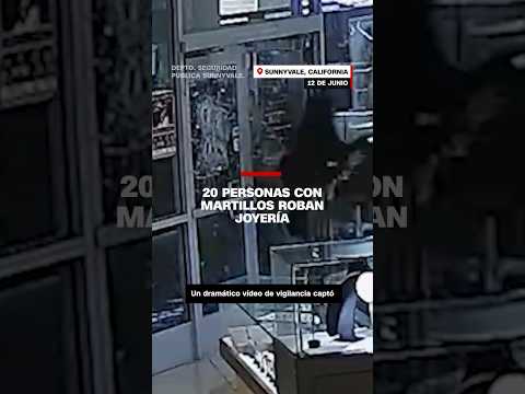 20 personas con martillos roban joyería 20 personas con martillos roban joyería