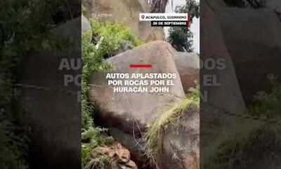 La fuerza del huracán John dejó varios autos aplastados por rocas en Guerrero