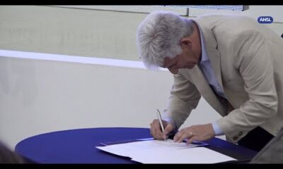 Claudio Poggi firma el decreto de viviendas en Juana Koslay