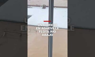 Edificio en Asheville flota río abajo y roza un edificio