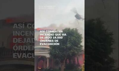 Así combaten incendio que ha dejado 14.000 órdenes de evacuación