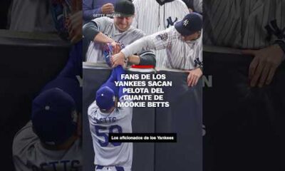 Fans de los Yankees sacan pelota del guante de Mookie Betts