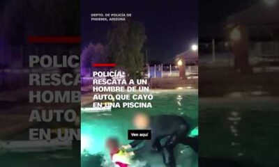 Policía rescata a un hombre de un auto que cayó en una piscina