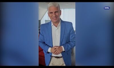 Claudio Poggi saluda a Juana Koslay